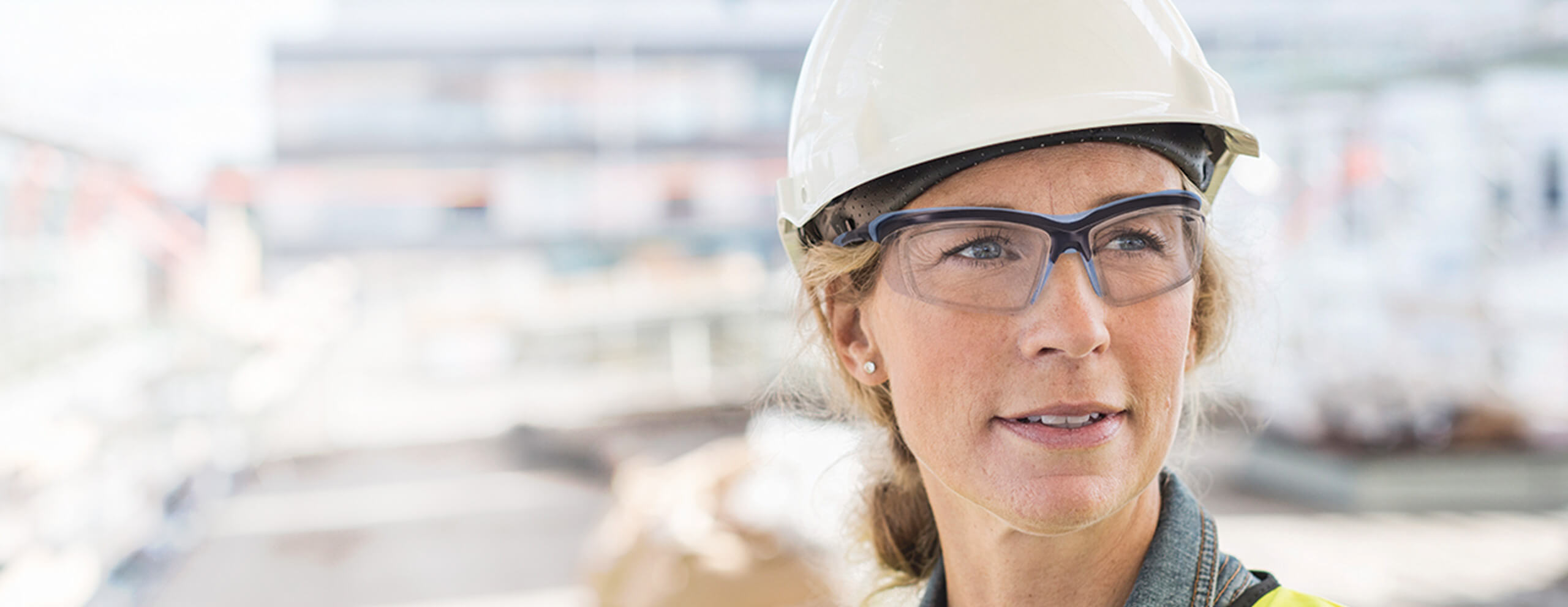 Construction worker wearing safety glasses